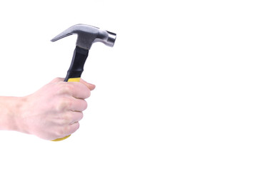 Hand holds hammer isolated on white background