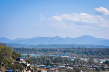 landscape with river and mountain, and blue sky looks very beautiful, in Haridwar  Uttarakhand 
