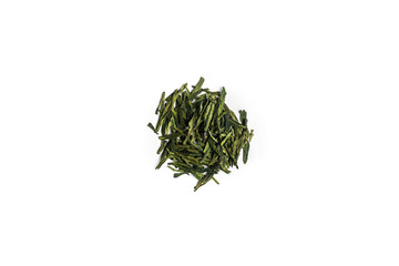 different sorts of black or green tea in bulk  on a white background close-up isolated