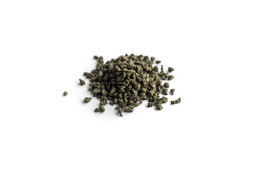 different sorts of black or green tea in bulk  on a white background close-up isolated