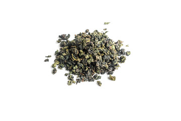 different sorts of black or green tea in bulk  on a white background close-up isolated