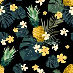 Wall murals Pineapple Seamless hand drawn tropical vector pattern with exotic palm leaves, hibiscus flowers, pineapples and various plants on dark background.