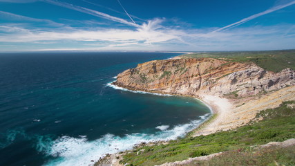 Fototapeta na wymiar View of the beautiful coastline near Cape Espichel, Sesimbra, Portugal timelapse