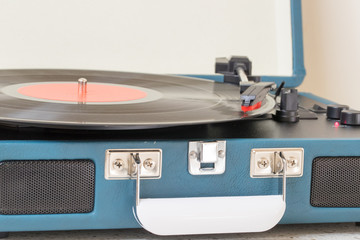 Vintage record player on the  table. - Image