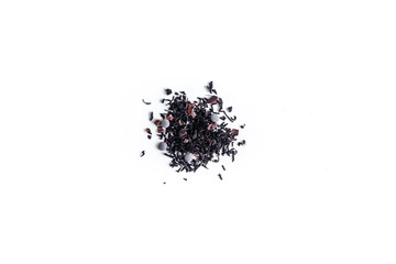 different sorts of black or green tea in bulk  on a white background close-up isolated
