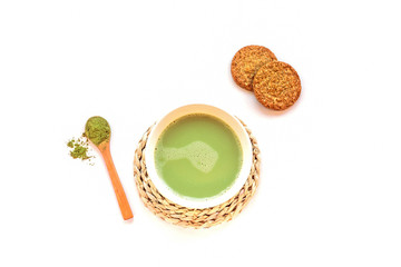 Matcha green tea in a cup on white table