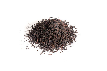 different sorts of black or green tea in bulk  on a white background close-up isolated
