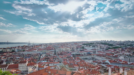 Fototapeta na wymiar View of the historical Lisbon Baixa downtown and Tagus River, from the Sao Jorge St. George Castle in Lisbon, Portugal timelapse