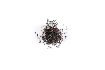 different sorts of black or green tea in bulk  on a white background close-up isolated