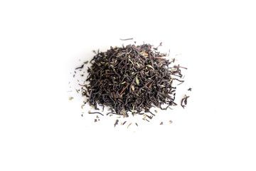 different sorts of black or green tea in bulk  on a white background close-up isolated