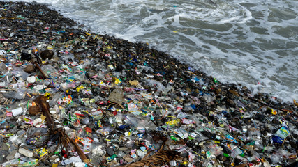 Too much rubbish on the beach and sea . Garbage on the vietnamese beach .Beach pollution concept.