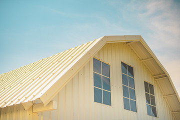 white wooden modern coffee shop with clear sky background on autumn season