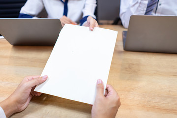 Human does handing a document
