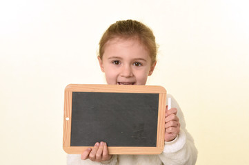 blonde girl with a slate