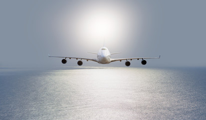 White passenger airplane in the clouds  - Travel by air transport