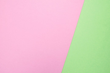 Pink and green empty geometric paper background.