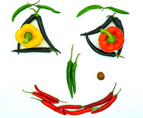 a big smile on the red pepper man
