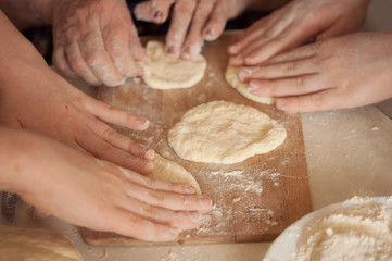 Making dough by  hands at bakery