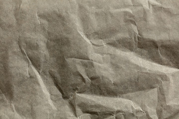 Close up shot of surface of crumpled paper texture for background or devices wallpapers. Abstract design, usual, natural materials. Detailed grungy artwork. Copyspace, advertisement. Vintage style.