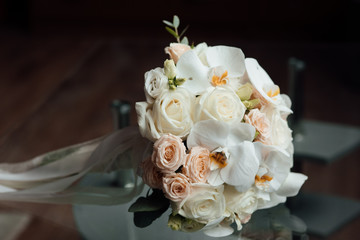 Details. Classic bridal round bouquet of roses. Wedding flowers. 