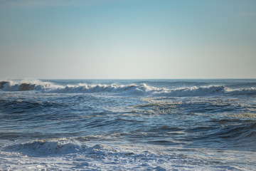 Naklejka na ściany i meble Endless ocean landcape. Waves on the water.