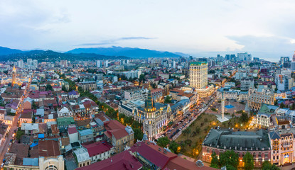 Fototapeta premium Panoramic view of Batumi and Astronomical clock, Georgia. Twilight over the old city and Downtown of Batumi - capital of Adjara, Georgia.