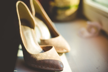 evening beige shoes on a light background