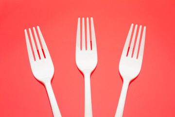 Plastic fork for casual food. White fork.