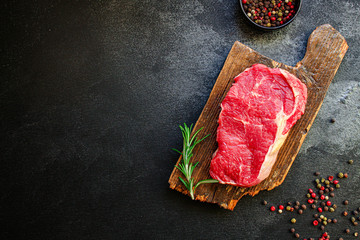 raw steak meat (beef or veal cooking) menu concept background. top view. copy spaces