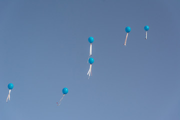 Balloons of various colors were released into the sky to celebrate graduation.