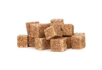 Cane sugar on a white background. Cane sugar cubes close up.
