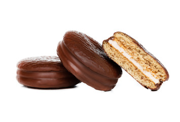 Choco pie on a white background. Chocolate covered mini cakes close-up. © eremin