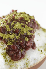 Sweet red beans shaved ice with matcha green tea powder 