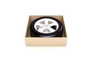 3D Rendering of Car Tire in Shopping Order Box on White