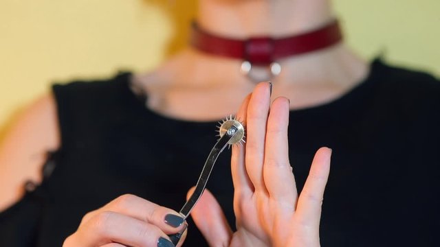 Stress relief in self-isolation COVID-19. Mental and physical relaxation. Closeup of a woman's hand on a neurological study of the sensitivity of the central nervous system. Scientific concept.