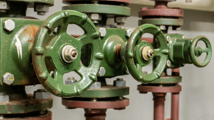 Old pipes and green valves