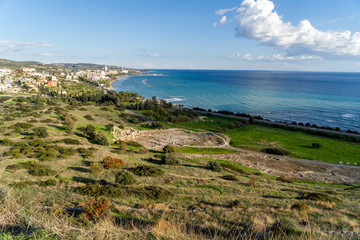 sunny landscape with ocean and clouds