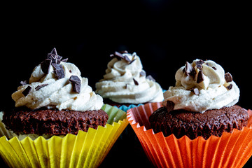 cupcake with pink icing and sprinkles