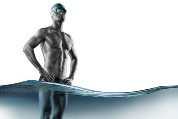 Swimming pool. Isolated muscular swimmer ready to start.	