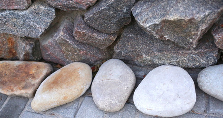  large brown stones, texture, outdoors in summer