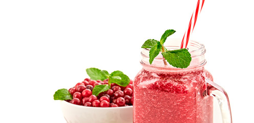 Cranberry smoothie in glass jar, healthy juicy pink vitamin drink, diet or vegan food concept. Freshly blended homemade fruit vitamins refreshing juicy cocktail. Tasty organic berries smoothie