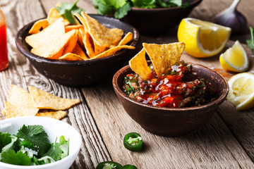 Homemade salsa and tortilla chips, favorite Mexican appetizer snack