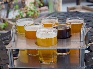Close up shot of many colorful glass of beer