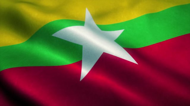 Myanmar flag waving in the wind. National flag of Myanmar. Sign of Myanmar seamless loop animation. 4K