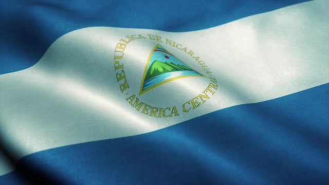 Nicaragua flag waving in the wind. National flag of Nicaragua. Sign of Nicaragua seamless loop animation. 4K