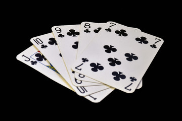 The combination of playing cards in poker on black background - Straight Flush