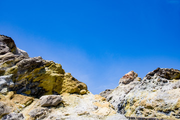 rocks with yellow sulfur-based outcrops on the island of Vulcano, Aeolian Islands, Messina, Sicily,...