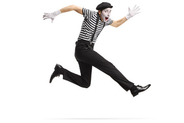 Happy mime jumping