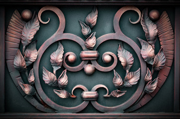 wrought-iron gates, ornamental forging, forged elements close-up