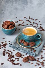 Homemade cookies with coffee mug on blue plate